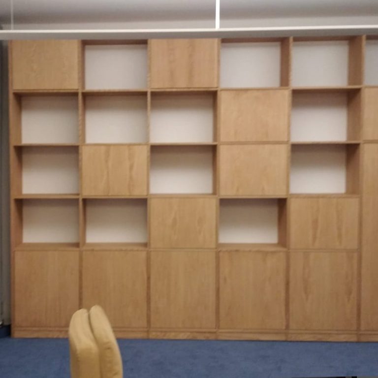 modular wooden wardrobe with open and closed shelves