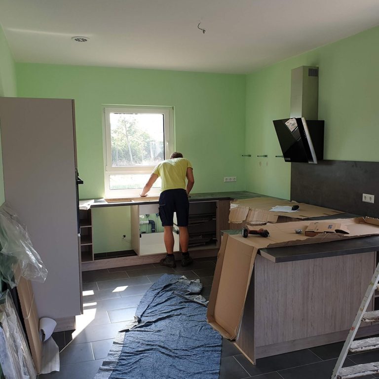 A installer during the assembly of the kitchen